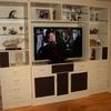 Custom wall unit hides all...